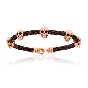 
                  
                    Brown Stingray Bracelet With Pink Gold Multi Skull
                  
                