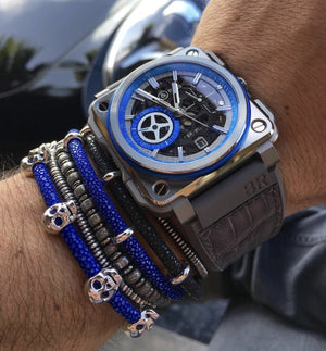 
                  
                    Blue Stingray Bracelet With Silver Multi Skull
                  
                