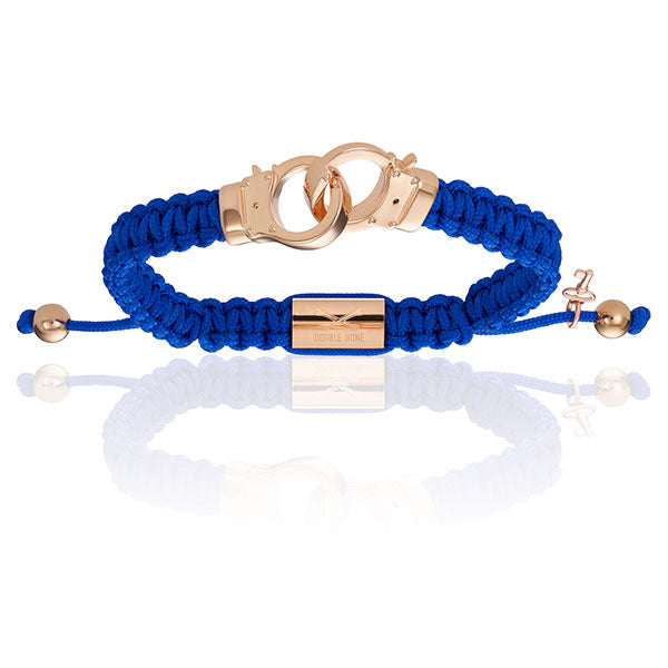 
                  
                    Blue Nylon With 18K Rose Gold Hand-cuff Bracelet
                  
                