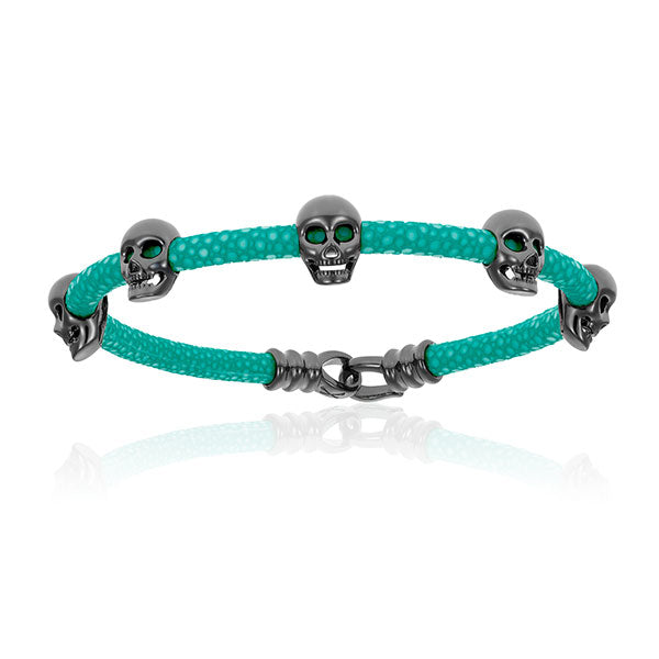 
                  
                    Turquoise Stingray Bracelet With Black PVD Multi Skull
                  
                