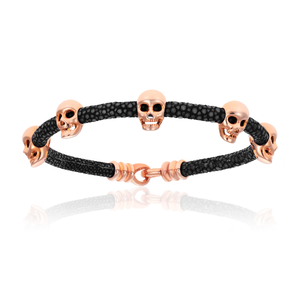 
                  
                    Black Stingray Bracelet With Pink Gold Multi Skull
                  
                