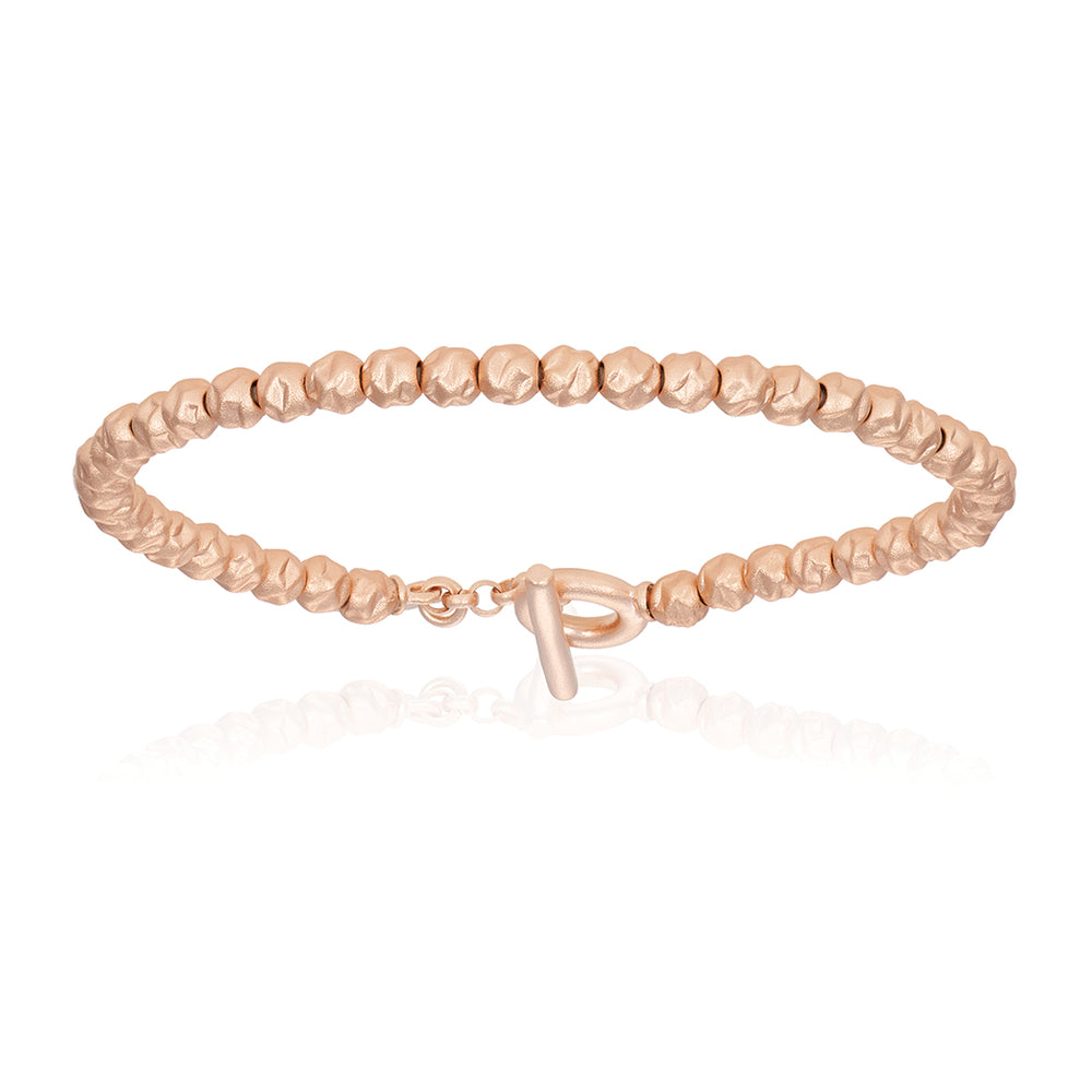 
                  
                    Pink Gold Studs Beaded Bracelet Combination
                  
                