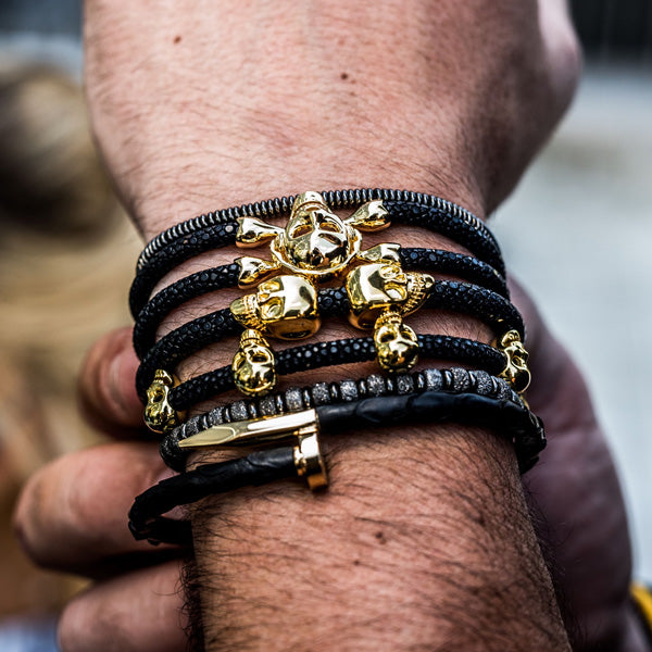 
                  
                    Black Stingray Leather with Yellow Gold Double Skull
                  
                